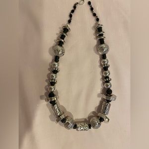 Handcrafted sterling jumbo bead necklace with black lava beads. 21 1/2” long.